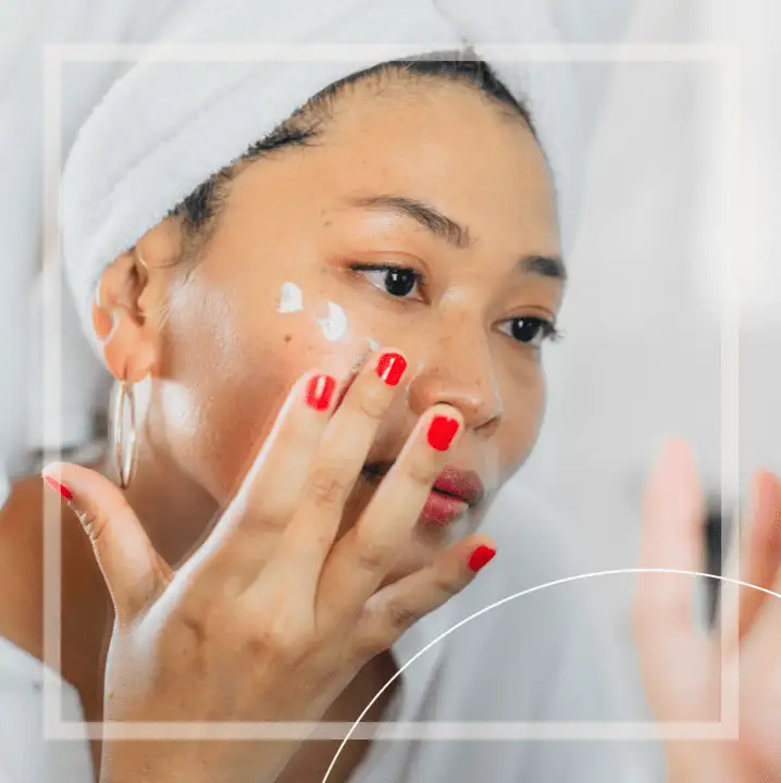 woman applying cream